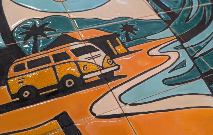 Mural realizado para un Estudio discografíco con diseño elegido por el cliente con motivo de paisaje de playa y tabla de Surf